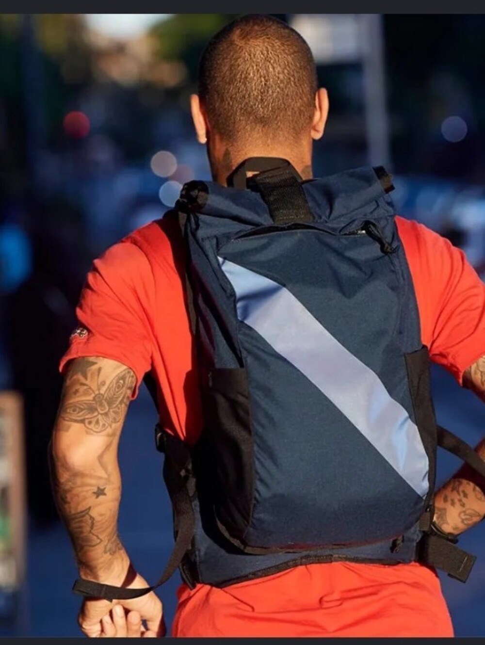 Navy Blue Roll-Top Sling Backpack with Reflective Diagonal Stripe